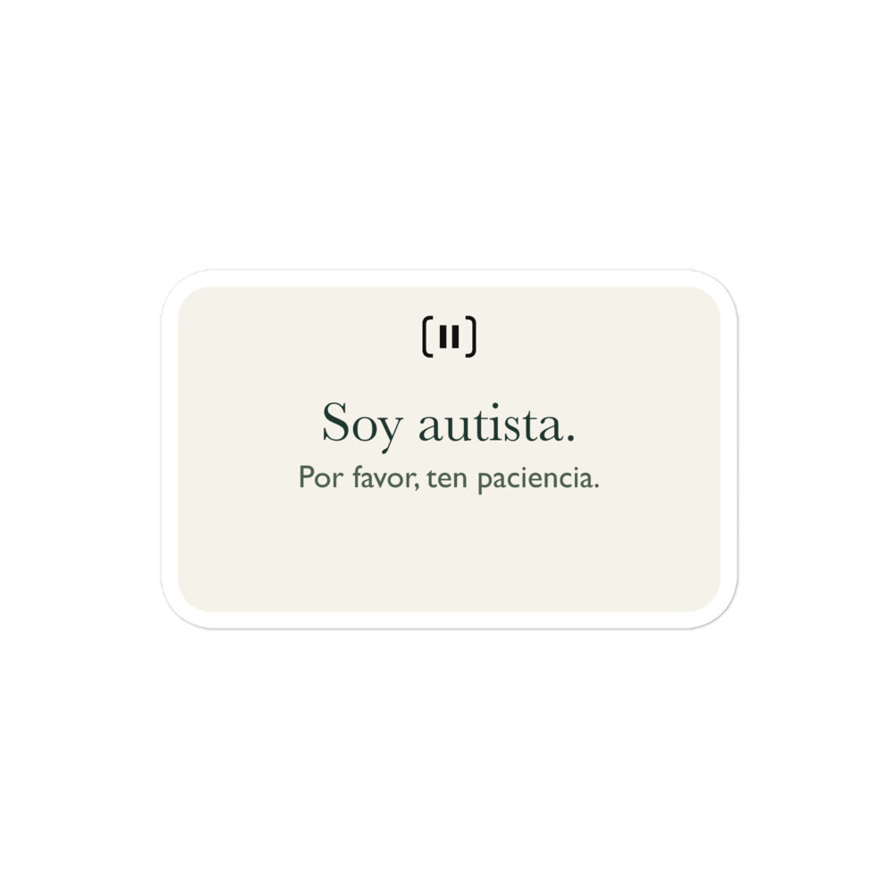 Maqueta del proveedor de una pegatina SIGNAL crema, con la marca de pausa redondeada y el texto «Soy autista. Por favor, ten paciencia» en verde.