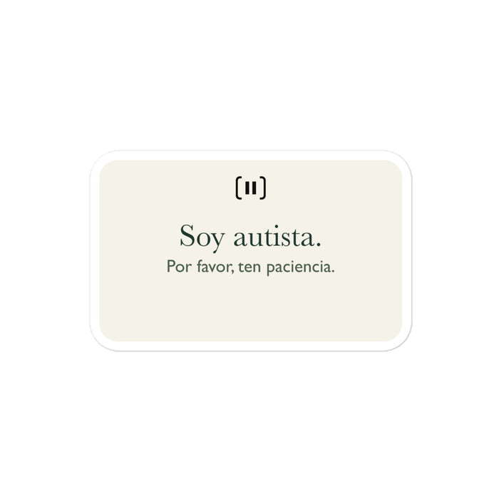 Maqueta del proveedor de una pegatina SIGNAL crema, con la marca de pausa redondeada y el texto «Soy autista. Por favor, ten paciencia» en verde.