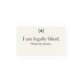 Supplier mockup of a cream SIGNAL sticker with a rounded pause mark and green text: “I am legally blind. Please be patient.”