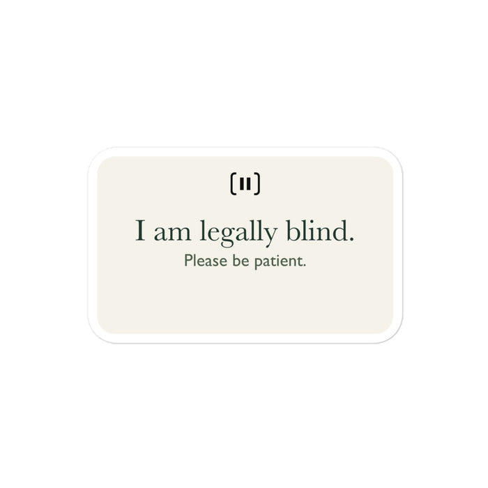 Supplier mockup of a cream SIGNAL sticker with a rounded pause mark and green text: “I am legally blind. Please be patient.”
