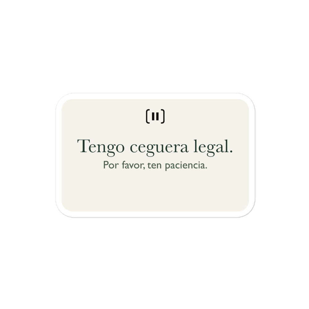 Maqueta del proveedor de una pegatina SIGNAL crema, con la marca de pausa redondeada y el texto «Tengo ceguera legal. Por favor, ten paciencia» en verde.